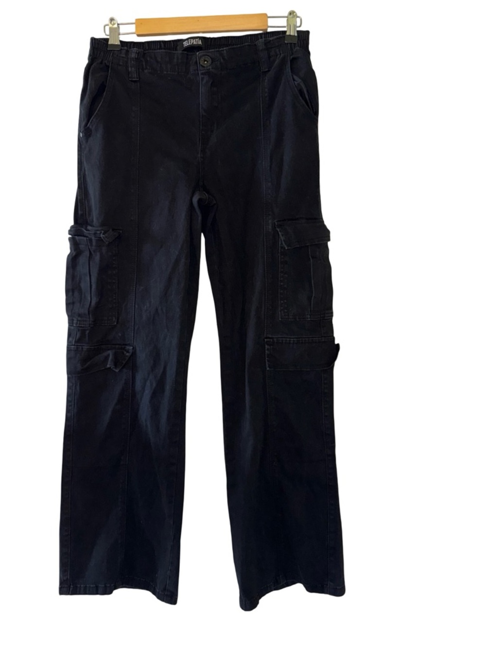 Telepatia cargo pants feature a structured, high-waisted fit
